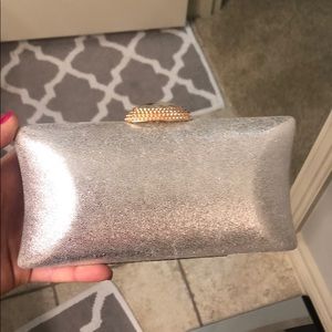 Silver and gold clutch